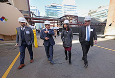 Boston mayor Wu kicks off Vicinity Energy’s electrification plans with the deconstruction of a steam turbine